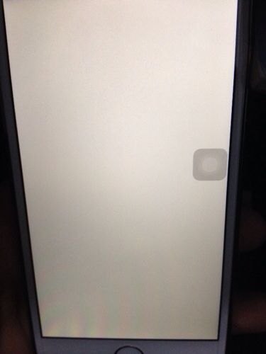 手机白屏时上有两点更白的斑点为什么？