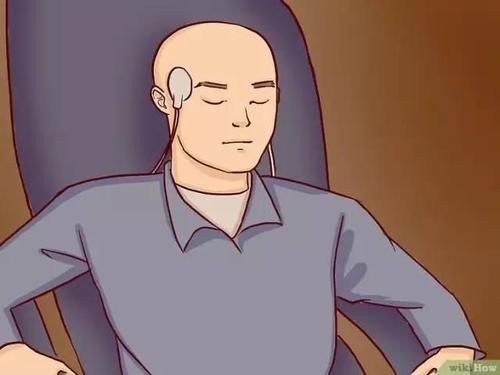 一个人晕车，而带上耳机听音乐就不怎么晕车，是基于什么原理？